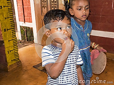 Children playing with toys balloon on the floor of the children`s room. Kindergarten educational games in India Editorial Stock Photo