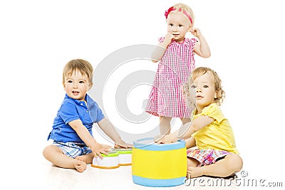 Children playing toys. Small Kids isolated white background Stock Photo