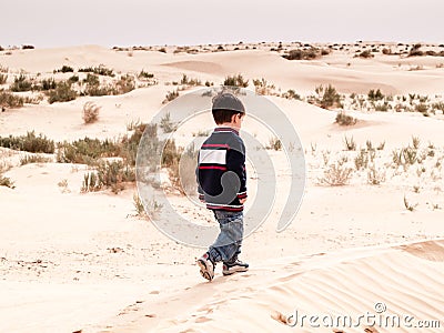 Child at desert Stock Photo