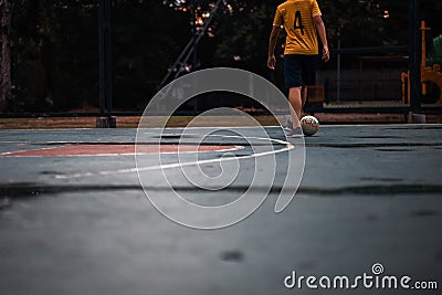 A children practice futsal in the park Stock Photo