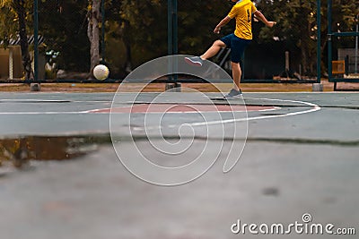 A children practice futsal in the park Stock Photo