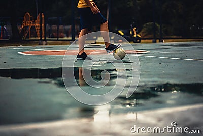 A children practice futsal in the park Stock Photo