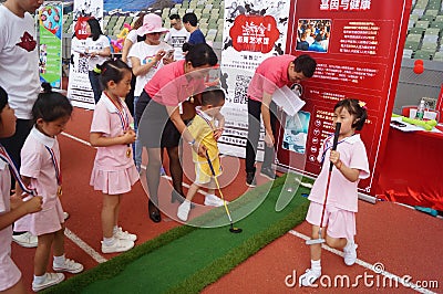 Children practice golf Editorial Stock Photo