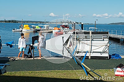 Children preparing racing dinghies at championships. April 18, 2013: Editorial Editorial Stock Photo