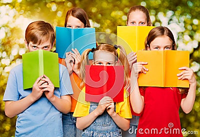 Children Read Books, Group of Kids Eyes behind Open Blank Book C Stock Photo