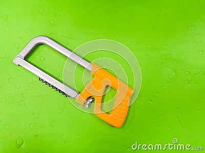 Children`s bait, on a green background. Tool for the child, repairman detsky, development for children, preparing the child for Stock Photo