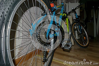 Children`s bicycles in the room. Two bicycles against the wall in the hallway. Stock Photo