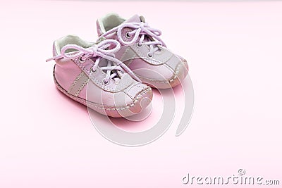 Children`s boots for girls pink color on a pink background Stock Photo