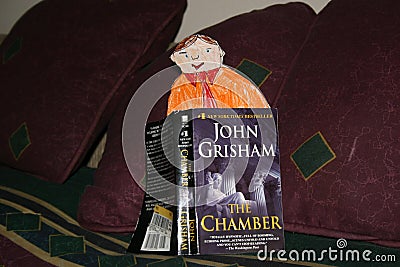 Flat Stanley Reading a Book Editorial Stock Photo