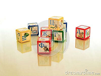 Children`s cubes - educational and educational game, teaches the child grammar and develops motor skills Stock Photo