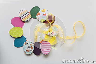 Children`s decoration for Easter made by hand on a smooth white background Stock Photo