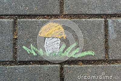 Children`s drawing with chalk on asphalt. Stock Photo