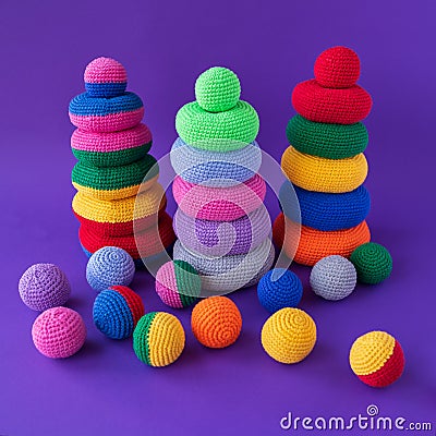 Children's educational game, knitted toys, children's hand motor development. Stock Photo