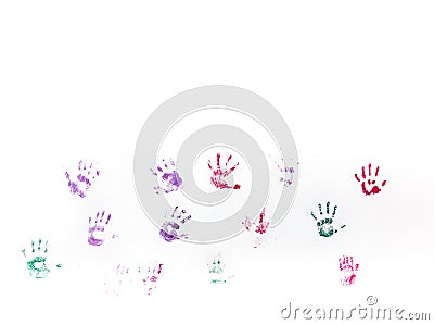 Children's hand prints on white wall Stock Photo