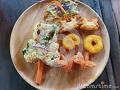 Children`s menu. Fried rice with egg. Stock Photo