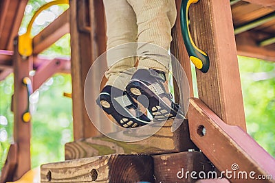 Children`s orthopedic shoes on the boy`s feet Stock Photo