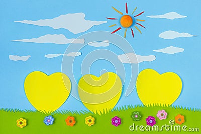 Children's play: yellow harts on blue sky Stock Photo