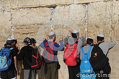 Children's prayer at the Wailing wall Editorial Stock Photo