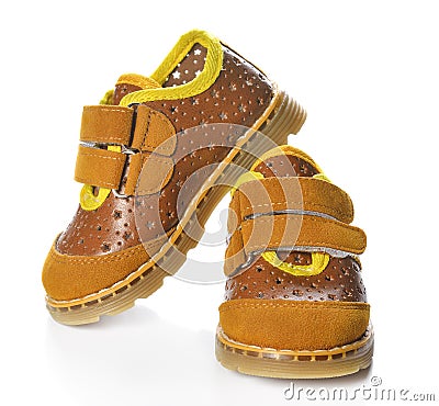 Children`s shoes isolated over the white background. Stock Photo