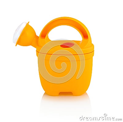 Children`s small plastic watering can isolated on the white background with shadow reflection. Watering-can toy. Stock Photo