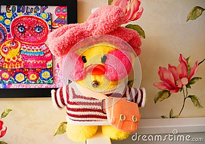 Children`s soft toy duck. Toy for children, duck, yellow, made of soft material. Editorial Stock Photo