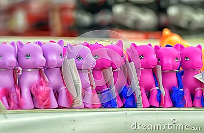 Children`s toys colored pink horse Editorial Stock Photo
