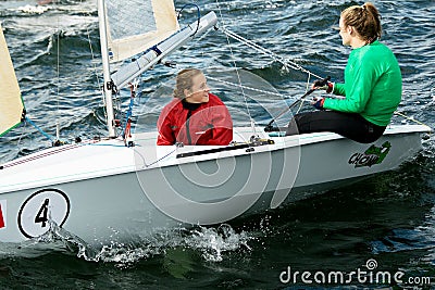 Children sailing competition in dinghies. Editorial Stock Photo