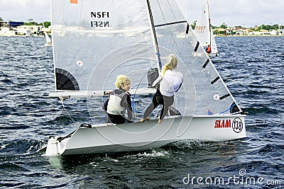 Children sailing competition in dinghies. Editorial Stock Photo