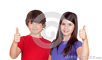 Children saying Ok with the thumb up Stock Photo