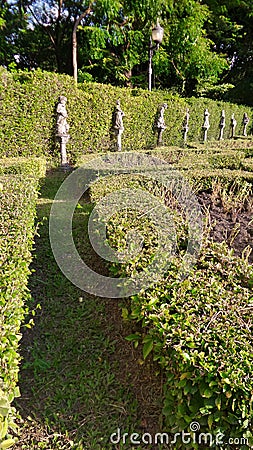 Children sculpture in Labyrint Garden in the park Stock Photo