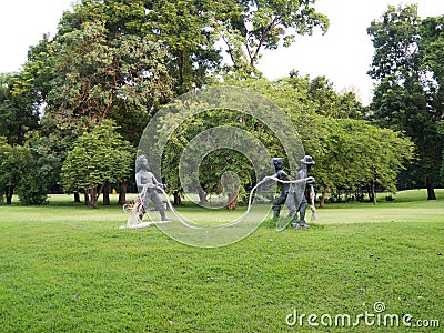 Children sculpture in a park Stock Photo