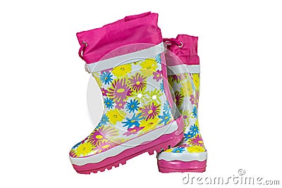 Children shoes and boots. Closeup of a pair pink rubber boots is Stock Photo