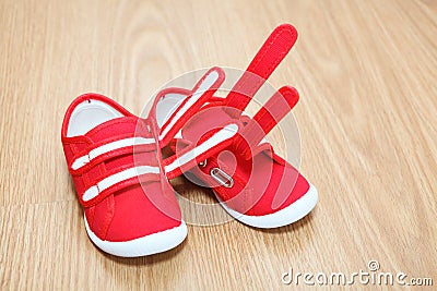 Children shoes on the floor Stock Photo