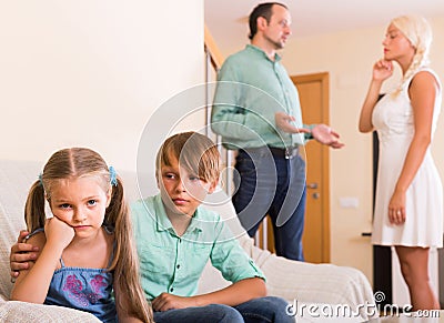 Children in silence while parents arguing Stock Photo