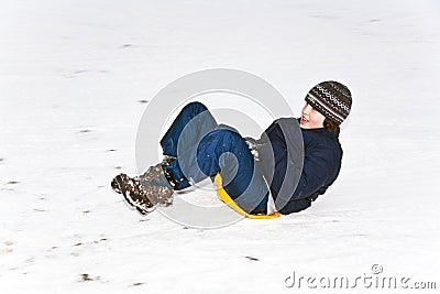 Children are skating at a toboggan Stock Photo