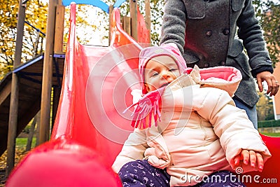 Children slide park outdoor playground winter recreation Stock Photo