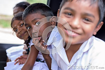 Children smiling on the car before go to school and looking at camera Editorial Stock Photo