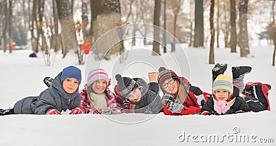 Children in the snow in winter Stock Photo