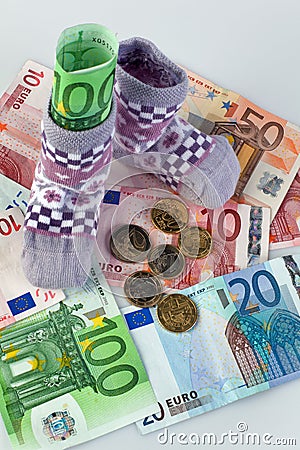 Children Socks and Euro banknotes Stock Photo