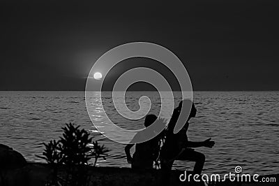 Children On The Sunset Shore Editorial Stock Photo