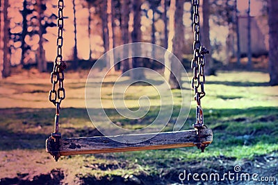 Children swing in the park vintage tone - Image Stock Photo