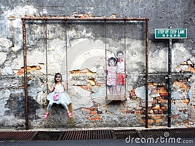 Children on the Swing Street Art Piece in Georgetown, Penang, Ma Editorial Stock Photo