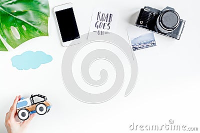 Children tourism outfit with camera and mobile on white background flat lay mockup Stock Photo