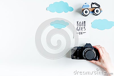 Children tourism outfit with toys and camera on white background flat lay mockup Stock Photo