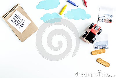 Children tourism outfit with toys and note on white background flat lay mockup Stock Photo