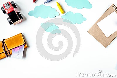 Children tourism outfit with toys and note on white background f Stock Photo