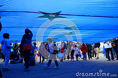 Children under European Union flag in Bucharest, Romania Editorial Stock Photo