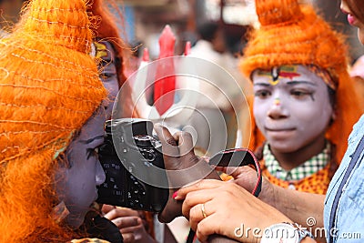 Children using Canon camera. Editorial Stock Photo