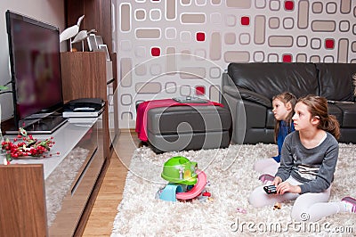 Children watching TV Stock Photo