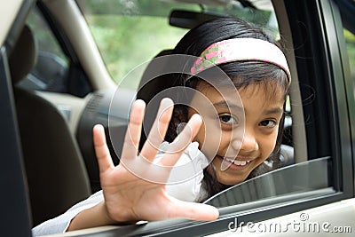 Children waving goodbye Stock Photo